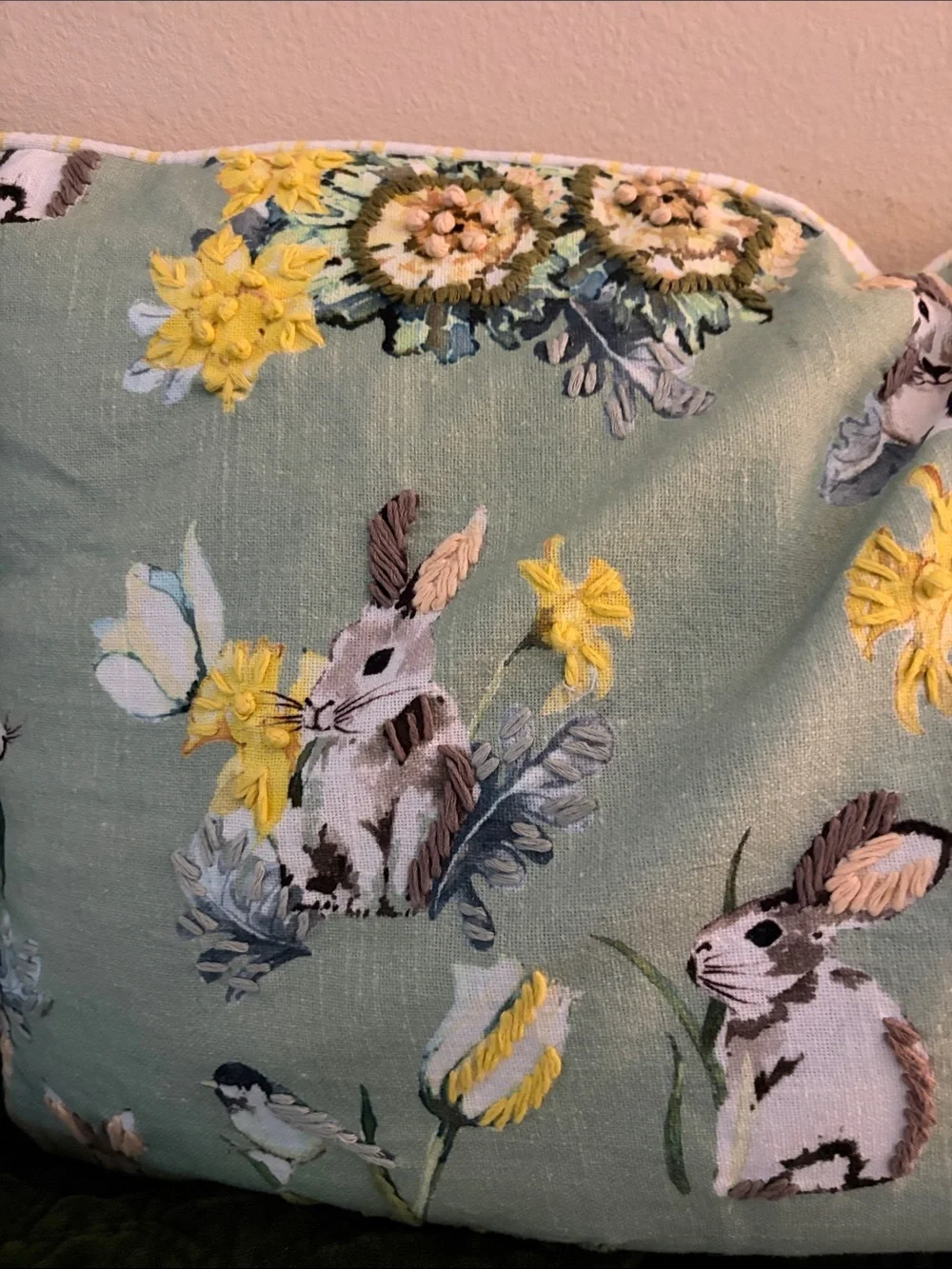 Accent pillow birds, daffodils,, tulips,rabbits  in greens, yellows, blues,